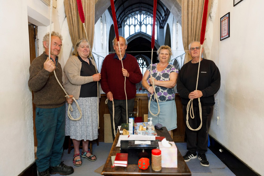 The bell ringers in St Cyriac's Church, Lacock, 2025. Image Credit: Martin Parr/Magnum Photos